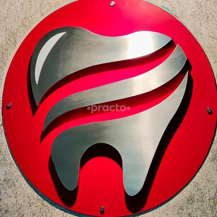 Karnavati Dental Care logo