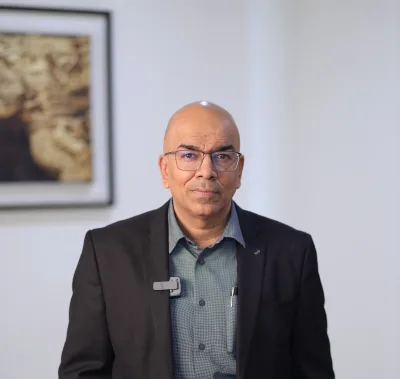 Dr. Arvind Sharma