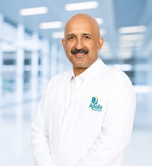 Dr. Havind Tandon