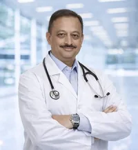 Dr. Anup Dhir