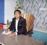Dr. Tushar Trivedi