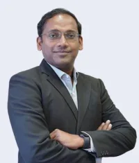 Dr. Adam Kamrudeen