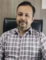 Dr. Munindra A. Raval